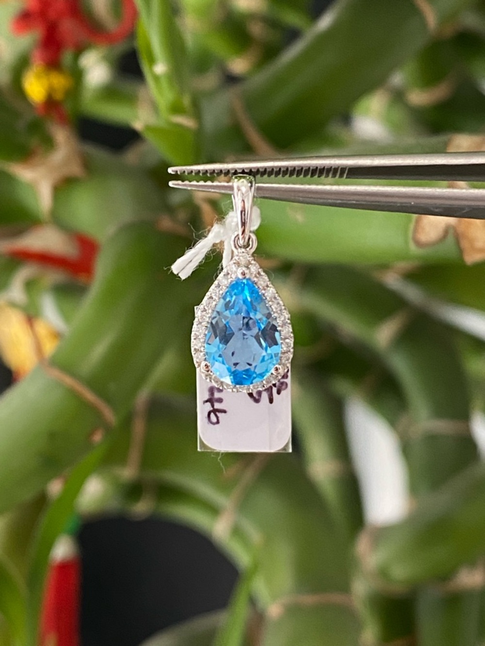 14K White Gold Natural Diamond And Blue Topaz Pear Shape Pendant